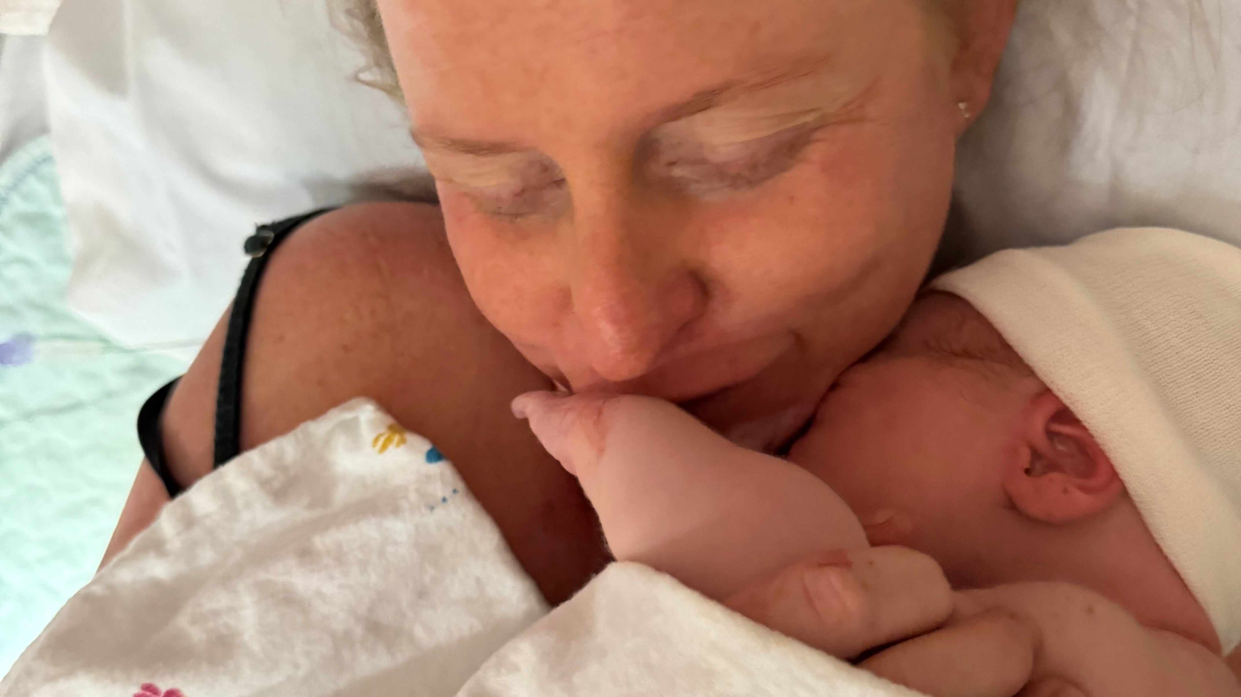 A mother and her baby after birth