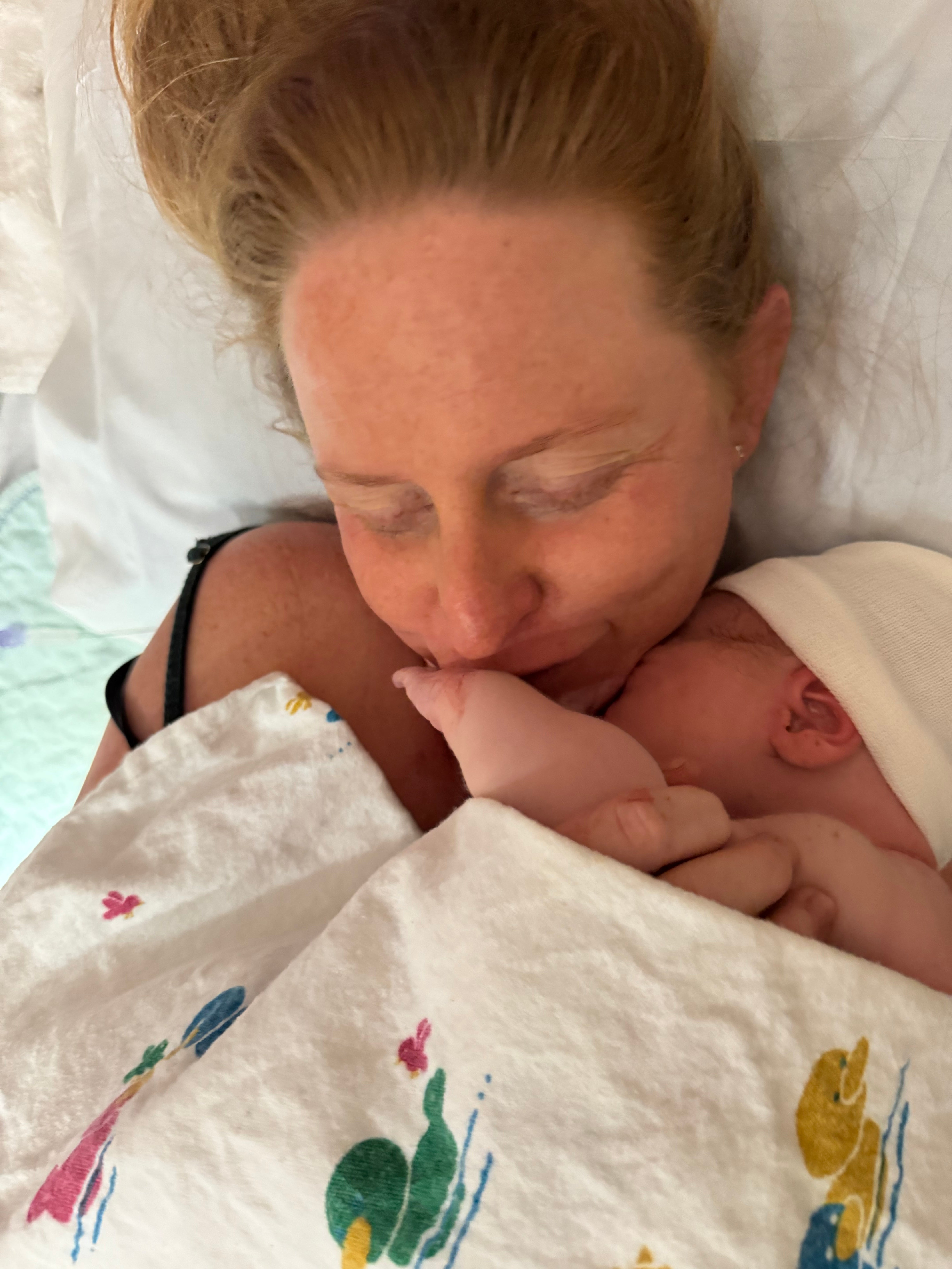 A mother and her baby after birth